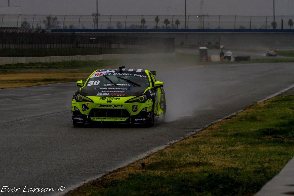 Abbate takes on the rain in her Edelbrock E-Force Supercharge Scion FRS. Photo by: Beverlee Larsson